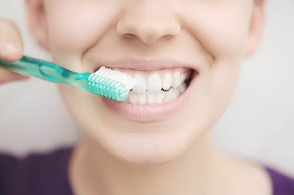 brushing teeth to protect enamel